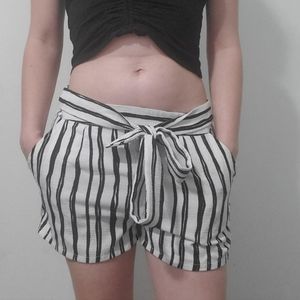 Lucid Pink black and white vertical stripe front tie shorts, size M